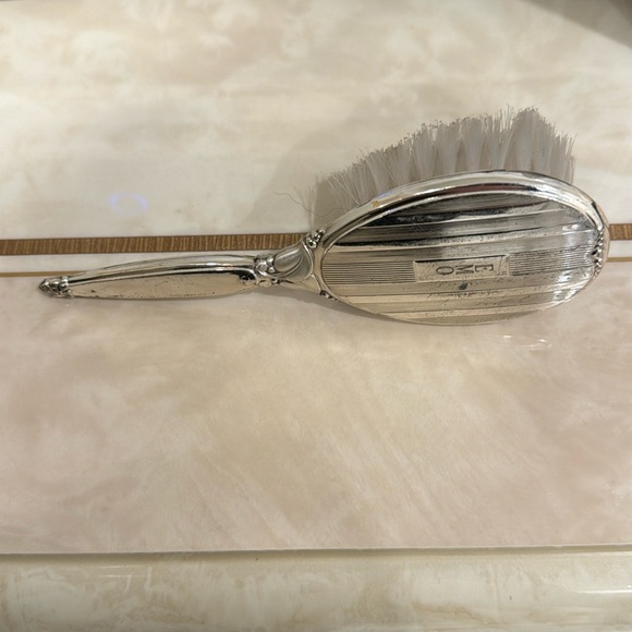 VINTAGE WEB STERLING SILVER BABY HAIR BRUSH W/RATTLE. 54.18GRS